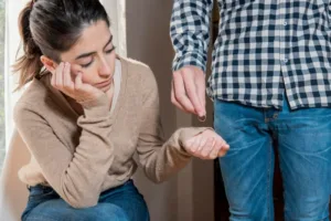 short term marriage concept of husband returning wedding ring to wife