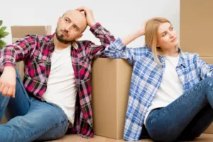 alimony concept of a couple pondering how moving in together might impact alimony